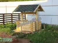 Колодец рубленый вокруг кольца