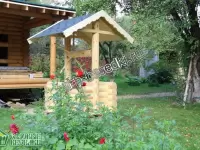 Рубленный колодец из дерева
