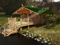 Баня с пристройкой под мангал и большой террасой